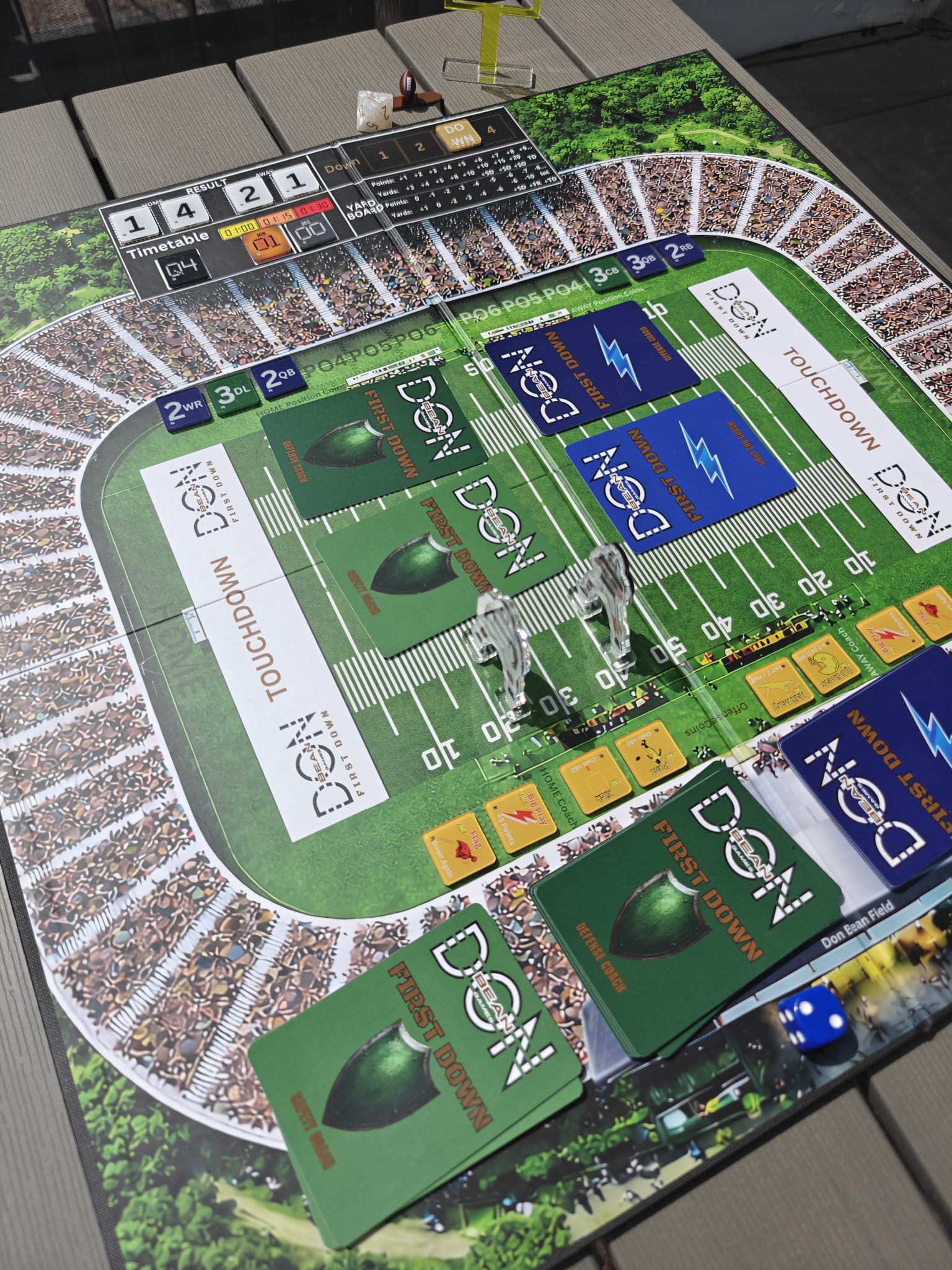 Players around a FIRST DOWN board game session